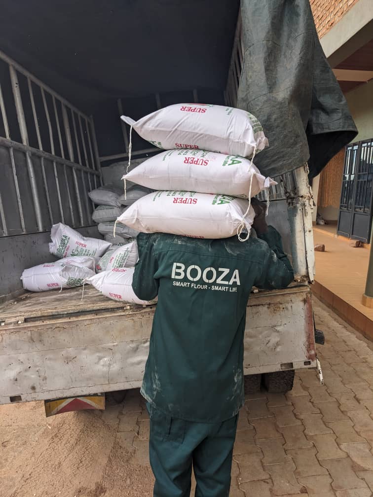 Booza delivery team loading flour