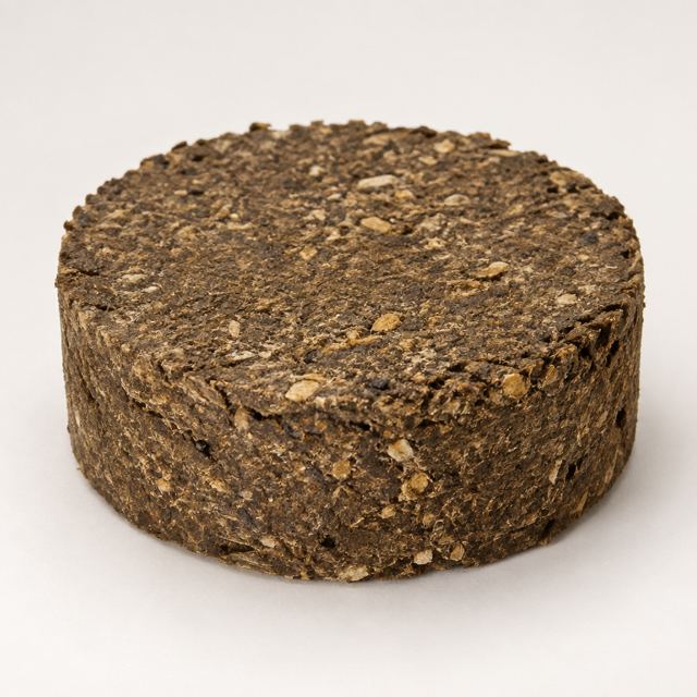 Cottonseed Cake — Illustration · Not a supplier photo